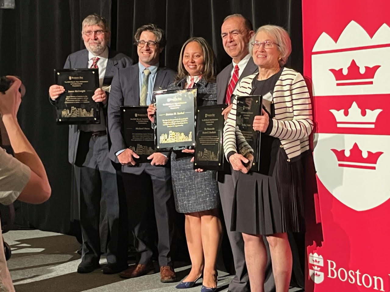 Michael photo holding BBA's Mary K. Ryan Pro Bono Award